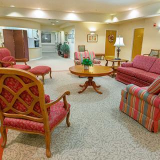 A cozy lounge area with comfortable seating and elegant furniture.