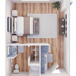 A modern and minimalist bedroom floor plan with a neatly arranged interior.