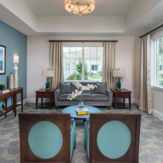 A modern living room with stylish furniture and decor.