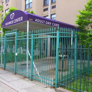 Entrance to an Adult Day Care Center with a fenced area.
