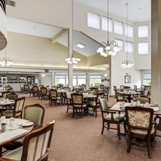 Spacious dining area with elegant decor and abundant seating.