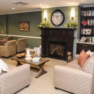 Cozy living room with a fireplace and comfortable seating.