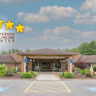 A welcoming view of the Jefferson Rehabilitation Center, featuring beautiful landscaping and a prominent entrance.