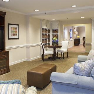 A cozy living room area with comfortable seating and modern furnishings.