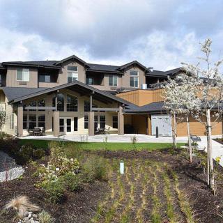 A modern residential home with a well-maintained garden.
