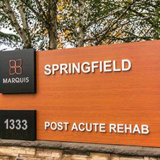 A sign for Springfield Post Acute Rehab facility.