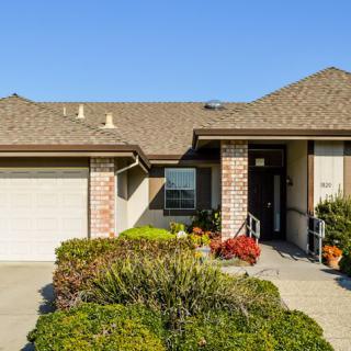 A charming suburban house with a well-maintained garden.