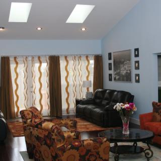 A cozy living room with stylish furniture and natural light.