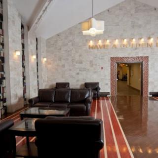 A modern lobby with comfortable seating and contemporary lighting.