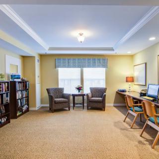 A well-organized office space with comfortable seating and workstations.