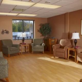 A cozy waiting room with comfortable seating and natural light.