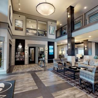 A modern and luxurious hotel lobby with stylish furniture and elegant lighting.