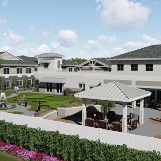 A modern residential building with a landscaped garden and gazebo.