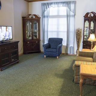 A cozy living room featuring classic furniture and decor.