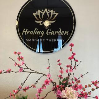 A serene and inviting space at Healing Garden Massage Therapy, featuring beautiful floral arrangements.