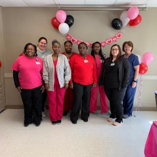 Healthcare team celebrating a special occasion together.