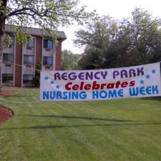 A banner on the lawn of Regency Park celebrating Nursing Home Week.