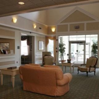 A cozy lobby area with comfortable seating and natural lighting.