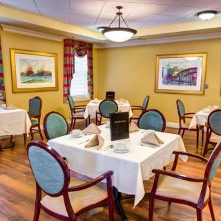 A well-decorated dining area with tables set for meals.
