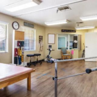 A rehabilitation room equipped for physical therapy sessions.