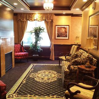 Elegant living room with classic decor and luxurious furnishings.