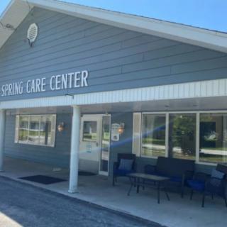 The exterior of a care center building during the day.