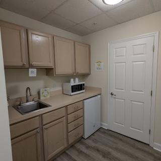 A cozy and functional kitchen space with modern amenities.