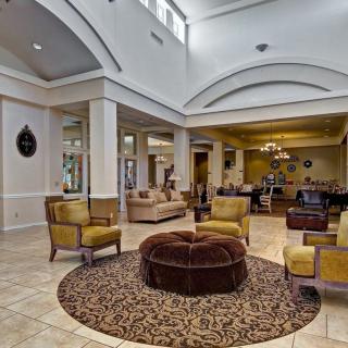 A luxurious hotel lobby featuring elegant furniture and stylish decor.
