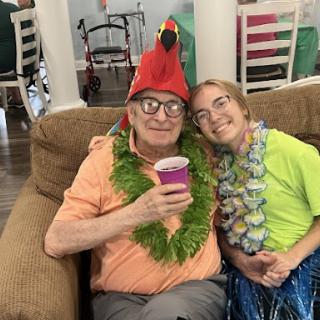 Enjoying a cheerful moment together at a festive gathering.