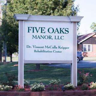Sign for Five Oaks Manor, LLC, Dr. Vincent McCella Knipper Rehabilitation Center.
