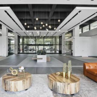 A modern and spacious lobby with contemporary furniture and elegant decor.