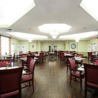 Spacious dining area with neatly arranged tables and chairs.