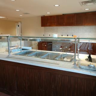 A clean and organized buffet setup in a restaurant.