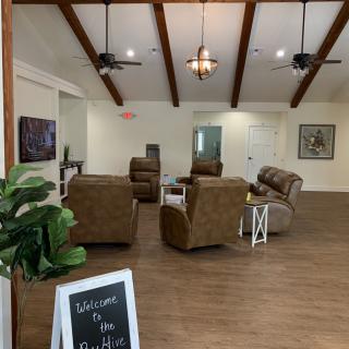 A welcoming lobby with comfortable seating and a rustic design.