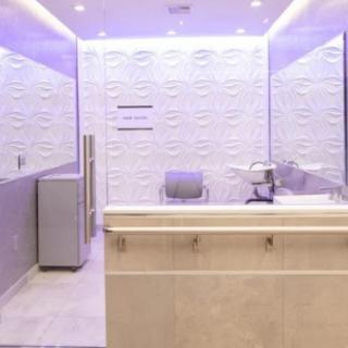 A modern and minimalist reception desk area in an office setting.