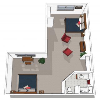 A two-bedroom apartment floor plan with furniture placement.