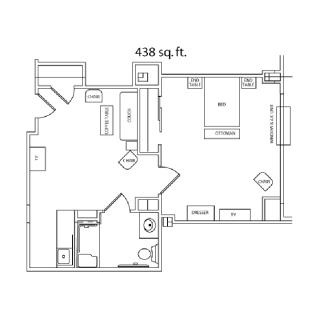 A floor plan of a 438 sq ft studio apartment, showing the layout of rooms and furniture.