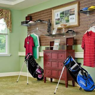 A stylishly organized golf-themed interior featuring golf attire and equipment.