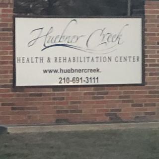 Sign for Harbor Creek Health & Rehabilitation Center with contact details.