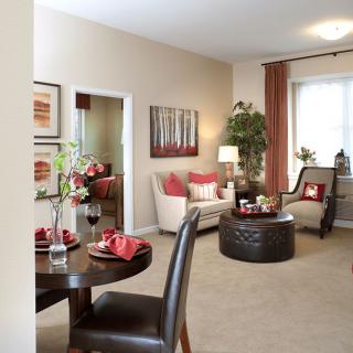 A modern and cozy living room with comfortable seating and stylish decor.