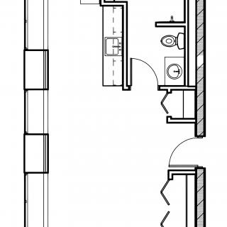 Architectural floor plan featuring a bathroom layout with a toilet and sink.