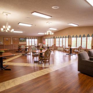 A spacious and inviting common area featuring comfortable seating and plenty of natural light.