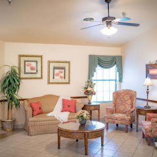 A cozy living room area featuring comfortable seating and tasteful decor.