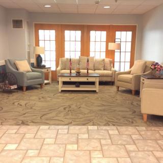 A cozy living room setup with sofas and a coffee table.