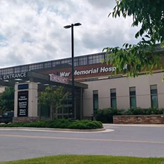 Exterior view of a healthcare facility with prominent signage.