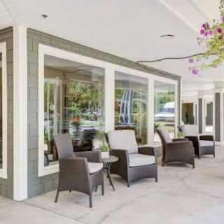 Outdoor patio area with comfortable seating arrangements.
