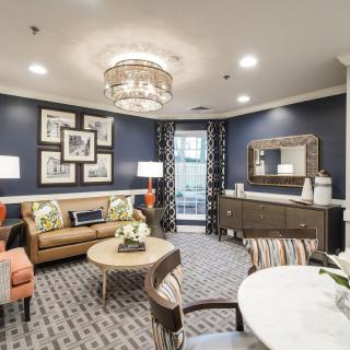A modern, cozy living room with stylish furnishings and decor.