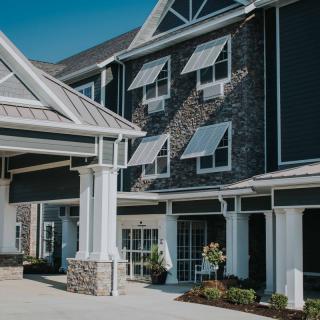 A modern hotel exterior with a welcoming entrance.