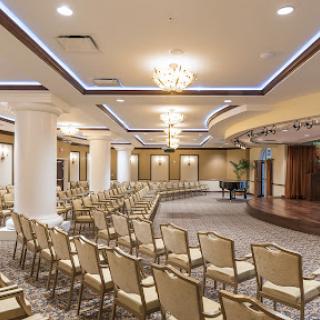 An elegantly designed conference room set up for an event.
