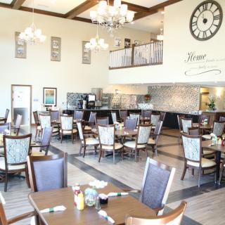 A spacious restaurant dining area with elegant decor and ample seating.